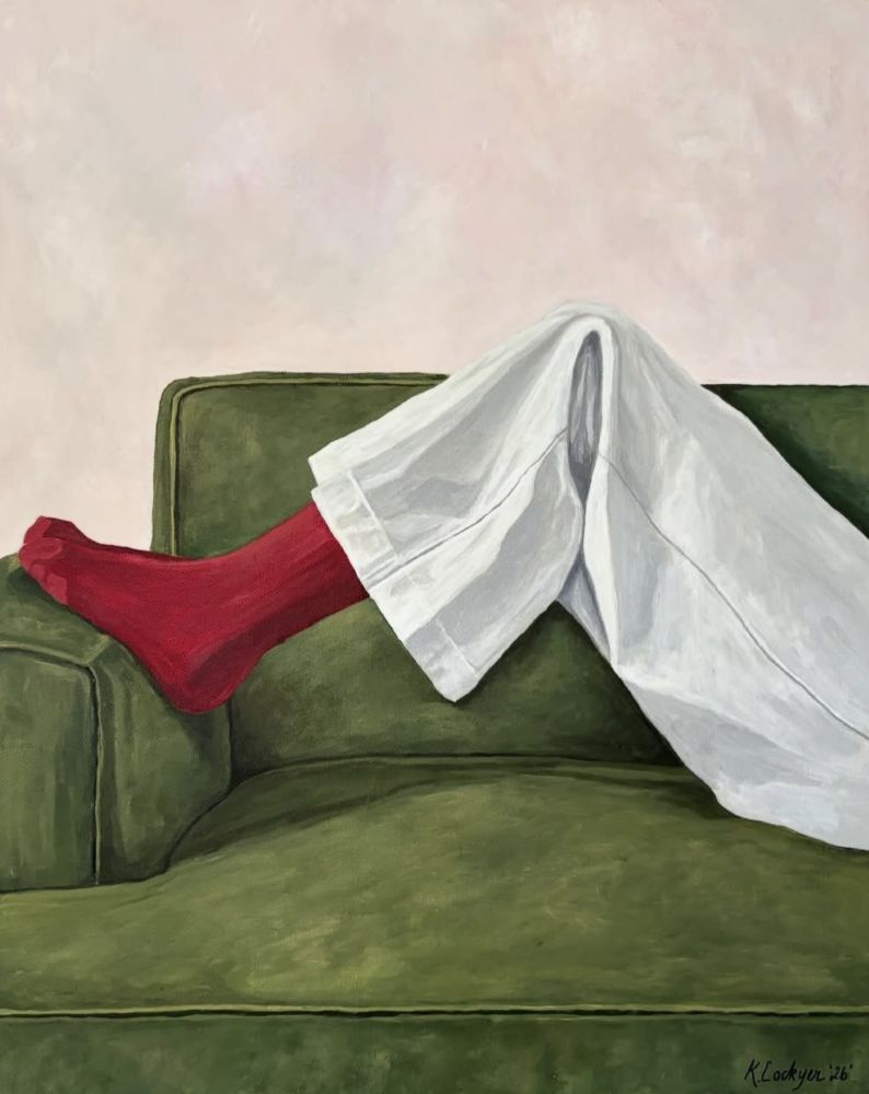In Red – 'At Ease' fine art print by Kristin Lockyer, a red sock resting on a green armchair